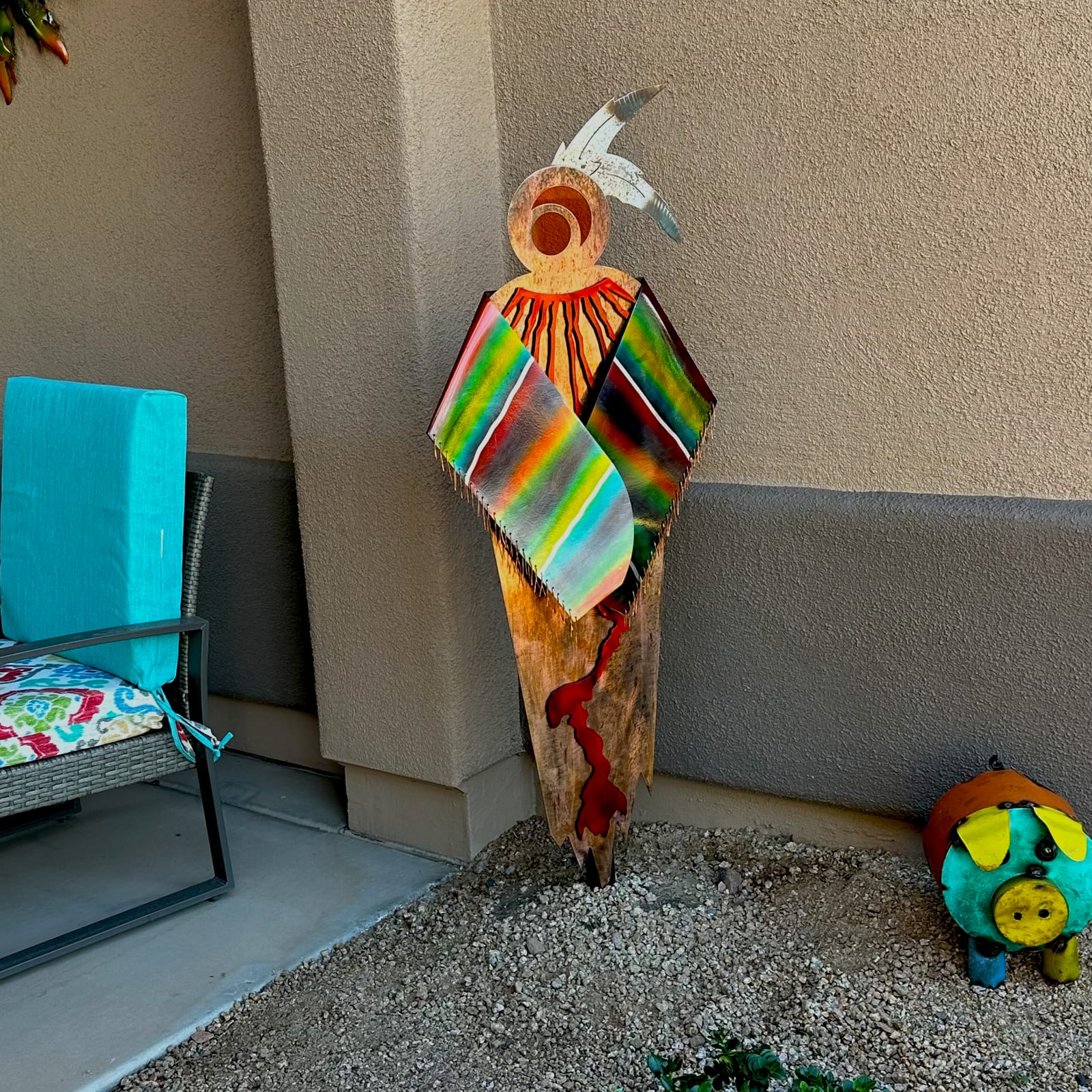 Meyerdirk Art figure sculpture on a patio